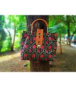 Flower Printed Black Based Cottom SIlk And Fox Lether Designer Handbag