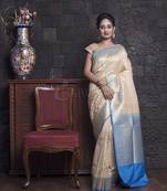 Beige And Sky Blue Benarasi With Zari Weaving And Border