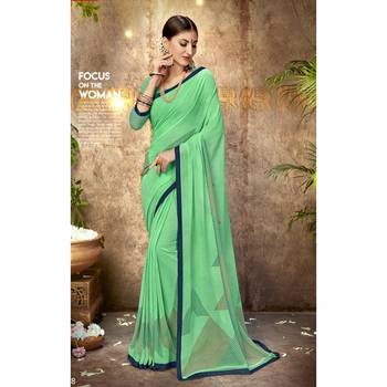 Sea green printed georgette saree with blouse 1