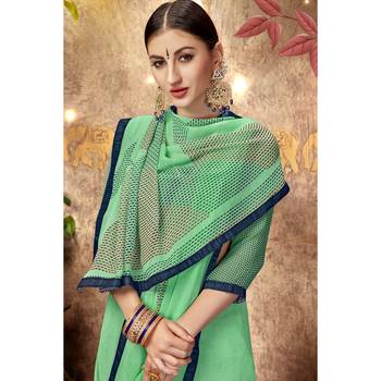 Sea green printed georgette saree with blouse 2