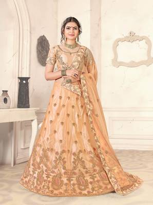 peach embroidered net semi stitched lehenga choli 1