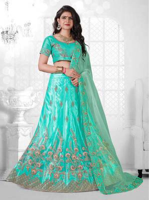 green embroidered net semi stitched lehenga choli 1
