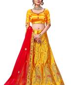 yellow embroidered silk blend semi stitched lehenga choli