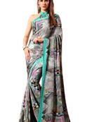  turquoise printed crepe saree with blouse