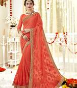 Orange embroidered georgette saree with blouse