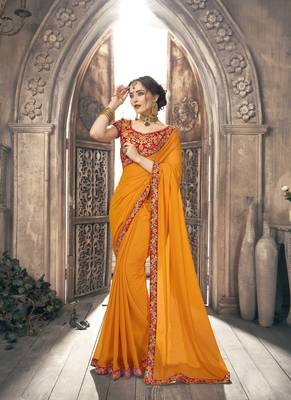 Yellow plain georgette saree with blouse 1