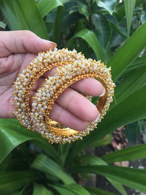 Gold pearl bangles and bracelets 2