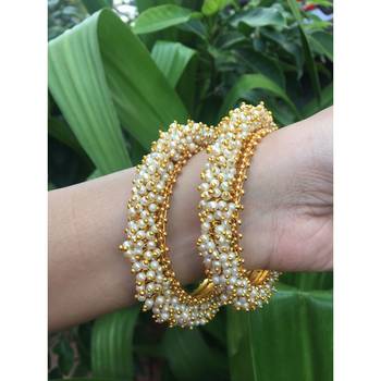 Gold pearl bangles and bracelets 3