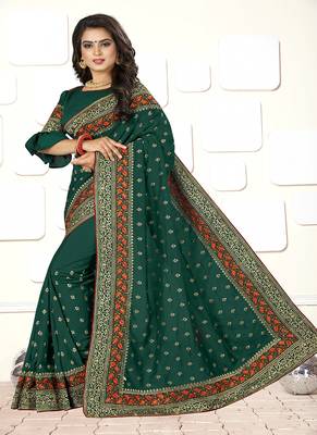   dark green embroidered art silk blend saree with blouse 2