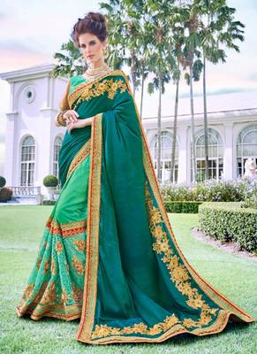   sea green embroidered georgette saree with blouse 1
