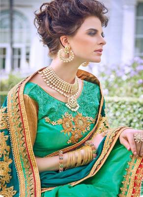   sea green embroidered georgette saree with blouse 2