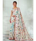 Cream printed tussar silk saree with blouse