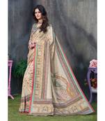 Beige printed tussar silk saree with blouse