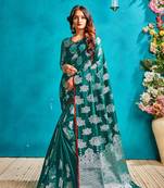 Green woven silk blend saree with blouse