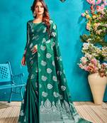Green woven silk blend saree with blouse