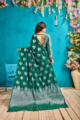 Green woven silk blend saree with blouse 3
