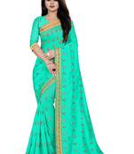 Green embroidered silk saree with blouse