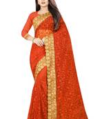 Orange embroidered net saree with blouse