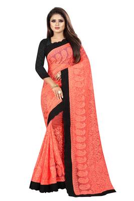 Orange embroidered net saree with blouse 1
