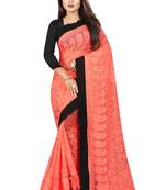 Orange embroidered net saree with blouse
