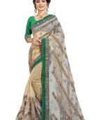 Green embroidered net saree with blouse