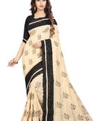 Beige embroidered georgette saree with blouse