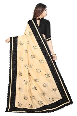 Beige embroidered georgette saree with blouse 3