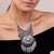 Statement Silver Necklace with Tassels
