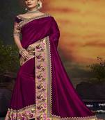   dark purple embroidered silk blend saree with blouse