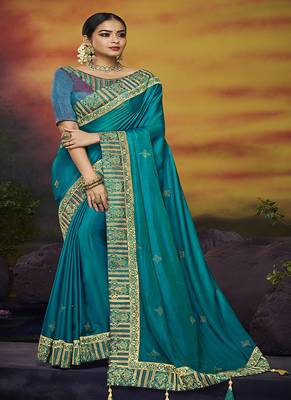 Teal embroidered silk blend saree with blouse 1
