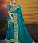 Teal embroidered silk blend saree with blouse