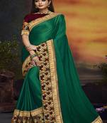   dark green embroidered silk blend saree with blouse