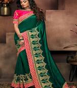   dark green embroidered fancy fabric saree with blouse