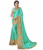 Cyan embroidered silk blend saree with blouse