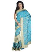 Turquoise Embroidered Raw Silk Saree With Blouse