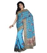 Turquoise Embroidered Raw Silk Saree With Blouse