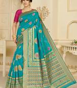   turquoise woven silk blend saree with blouse