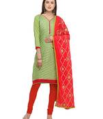 Green banarasi brocade unstitched salwar suit with embroidered dupatta