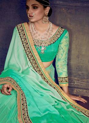 Sea green embroidered chiffon saree with blouse 2