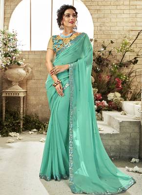 Sea green plain georgette saree with blouse 1