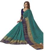  green woven silk saree with blouse