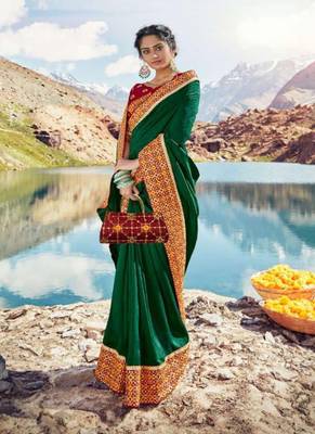   dark green embroidered silk blend saree with blouse 1