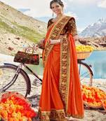 Orange embroidered silk blend saree with blouse