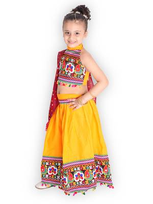yellow embroidered mirror work navratri traditional lehenga choli 3