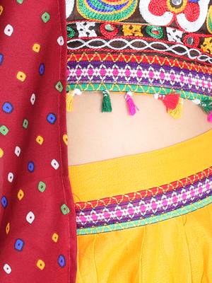yellow embroidered mirror work navratri traditional lehenga choli 5