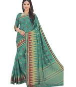Green woven raw silk saree with blouse