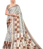 Cream printed art silk saree with blouse