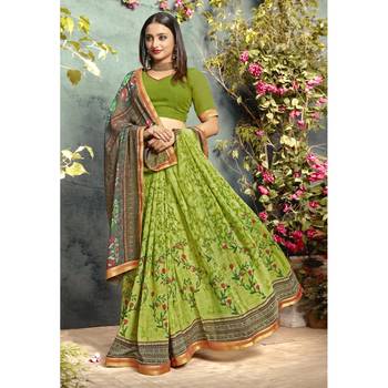 Green printed georgette saree with blouse 1
