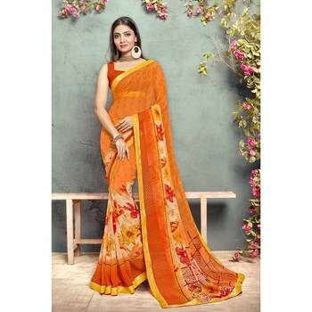Orange printed georgette saree with blouse 1