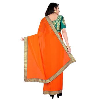 Orange plain georgette saree with blouse 3